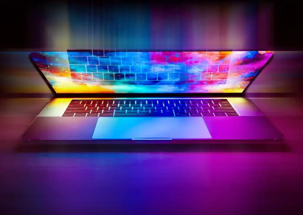 Digital submissions to REF - image of a laptop with a colourful image