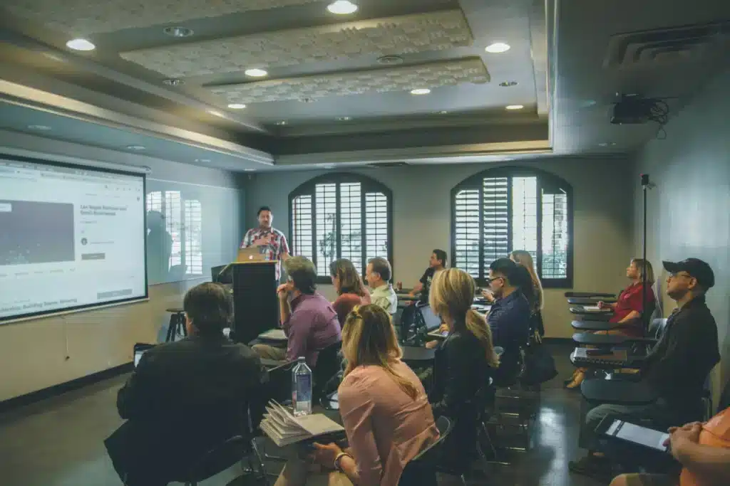 Students and teachers in a small lecture room