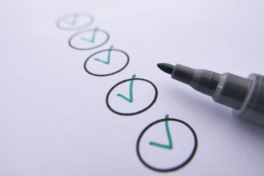 A checklist ticked off in green pen